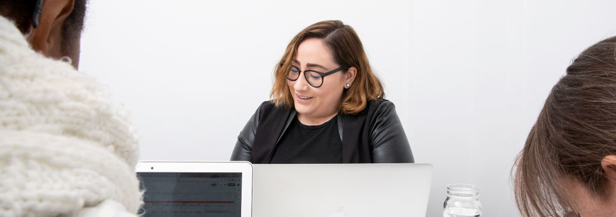 Yahira Cruz works with colleagues in the On-Ramps office.